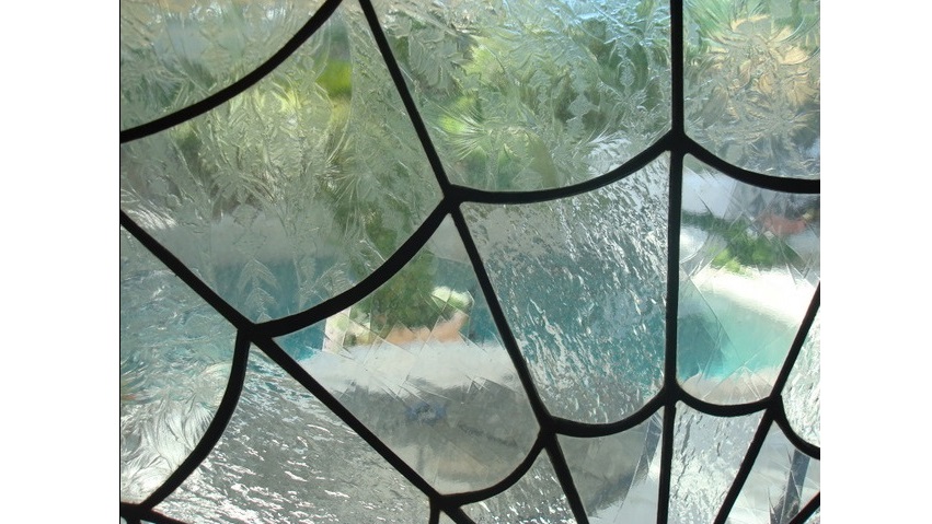 stained glass spider web window
