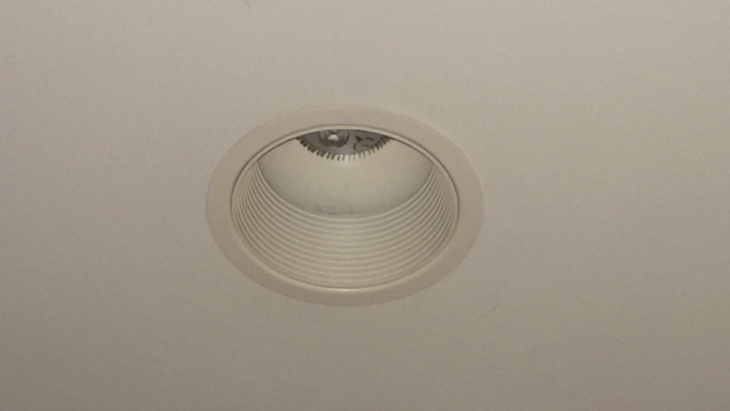 recessed can light spray-painted white