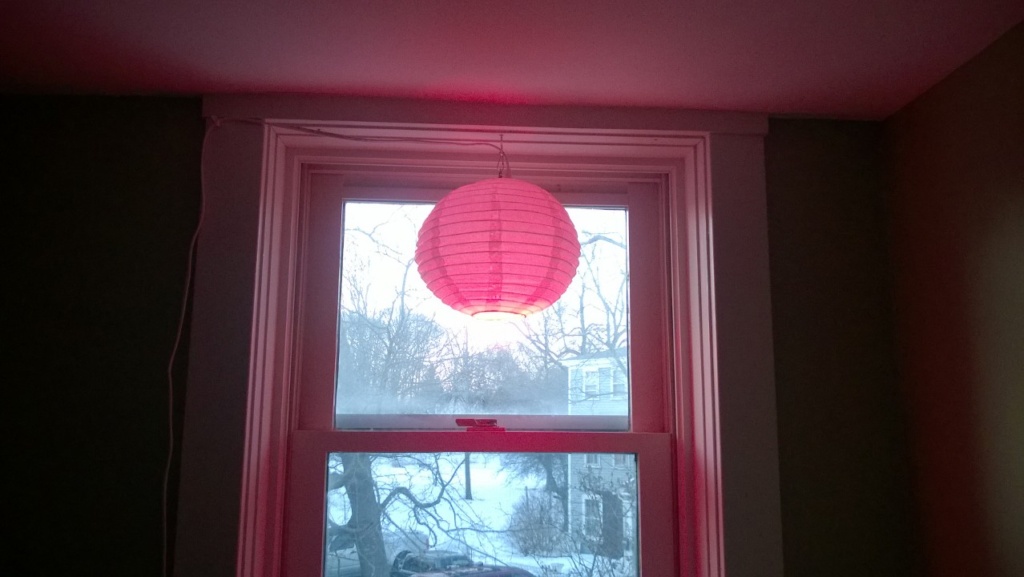 chinese lantern hanging in upstairs hall window