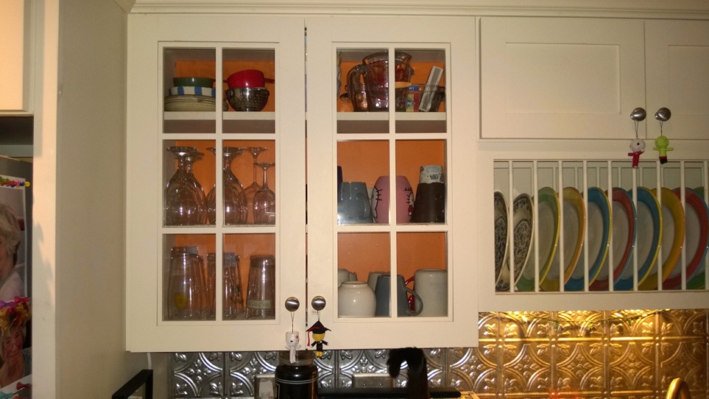 painting the glass front kitchen cabinet benjamin moore calypso orange