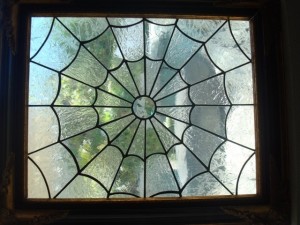 stained glass spider web window