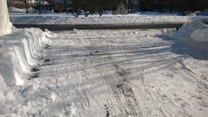 our driveway after being plowed by a large truck