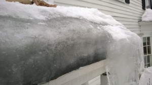 ice dam on front entranceway roof during snowmageddon 2015