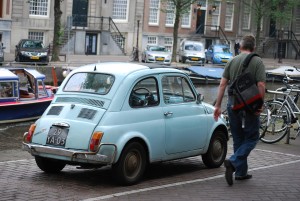 my brother seth verry looking at an old fiat in amsterdam
