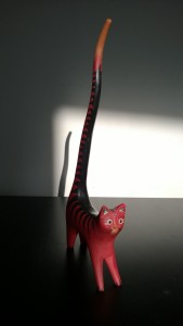 red long tailed cat from neil street east in london