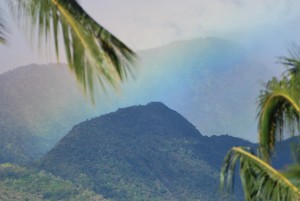 maui hawaii rainbow over mountains