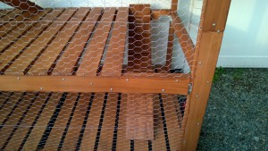 attaching ramps for bonkers to the outdoor cat enclosure / catio