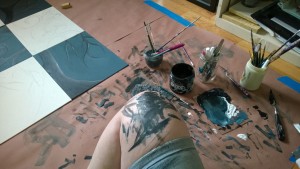 i am a very messy painter girl cave art paint mixing on knee
