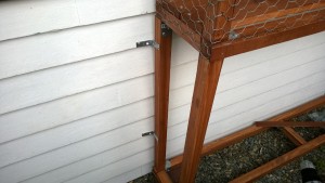 attaching the outdoor cat enclosure / catio connector to the catio and house