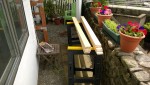 outdoor cat enclosure / catio cutting the shelf slats in the yard