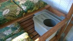 litter box installed in the outdoor cat enclosure / catio