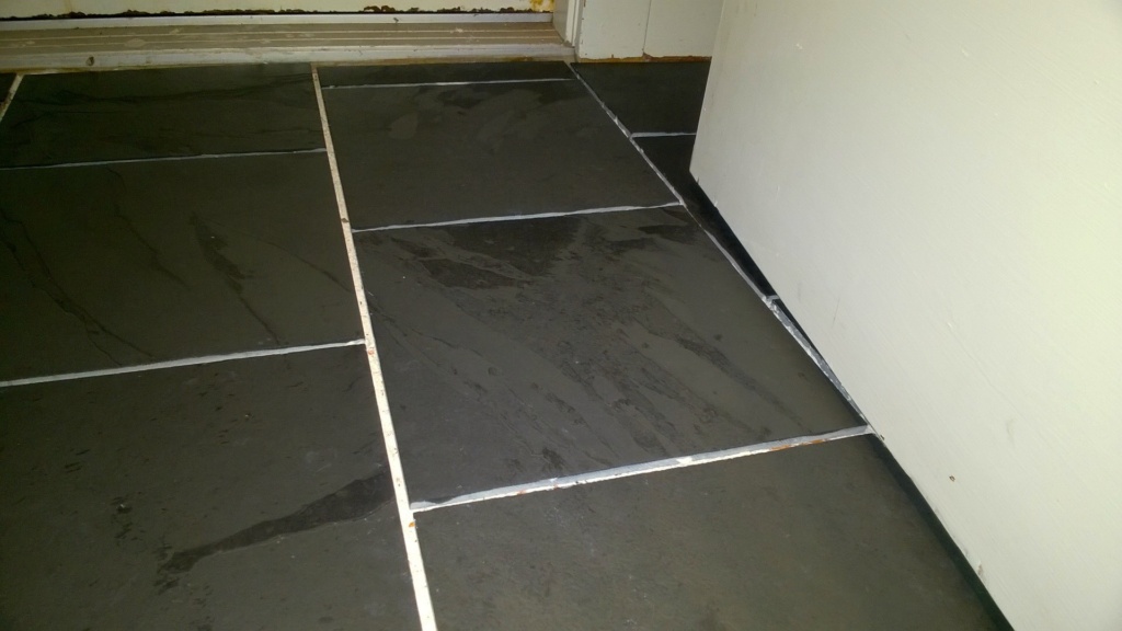 slate tiles laid in the front hall