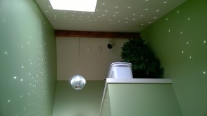 disco ball reflections / sparkles / polka dots in the upstairs hallway