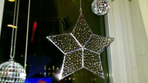 bubble glass stained glass star hanging in living room window