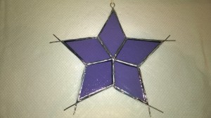 purple stained glass snowflake star