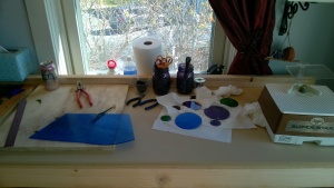 creating stained glass circles on the workbench in the girl cave