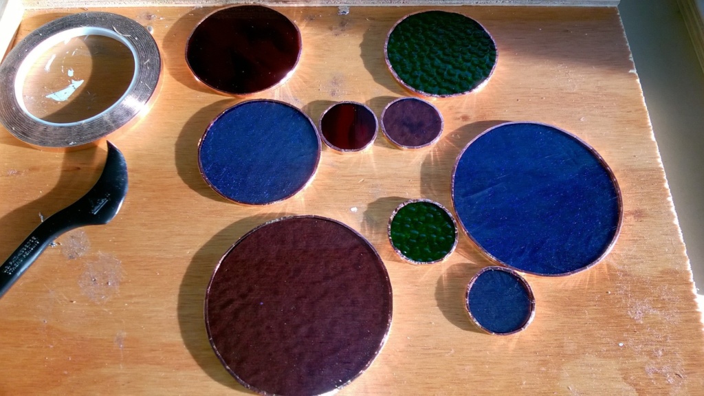 creating stained glass circles, copper foiling the edges