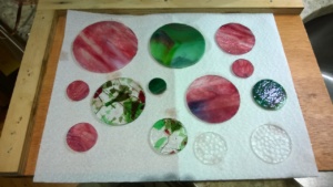my second batch of stained glass circles cut and washed