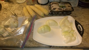 cubing the onions to prepare them for grilling