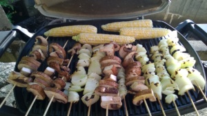 grilling skewered onions, skewered portobellos, and corn on the cob