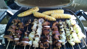 grilling skewered onions, skewered portobellos, and corn on the cob