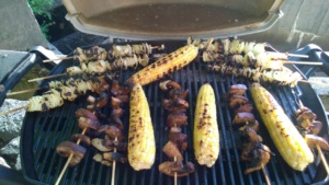 grilling skewered onions, skewered portobellos, and corn on the cob