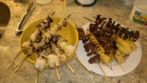 grilled skewered onions, skewered portobellos, and corn on the cob