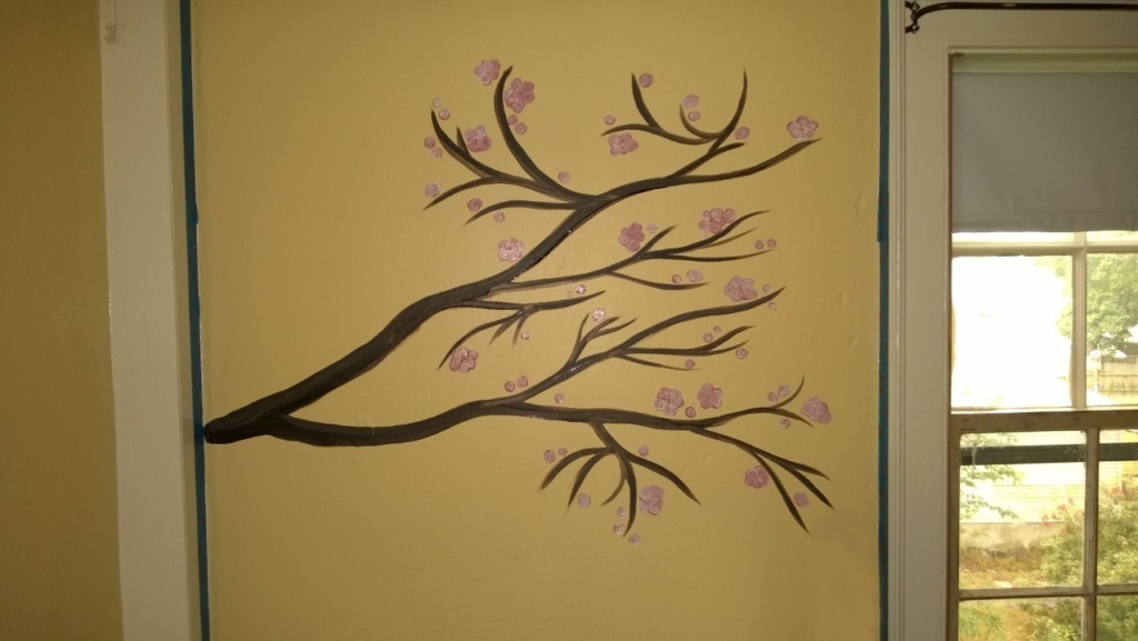 cherry blossom branch i painted on abbie's twins' bedroom wall