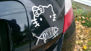 the devil fish and hello kitty stickers on my car
