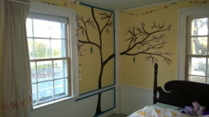 i painted a full cherry blossom tree on abbie's wall