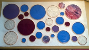 today i foiled and soldered the edges of my 27 stained glass circles