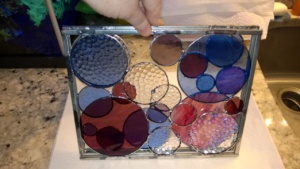 my 2 newest stained glass circle frames layered