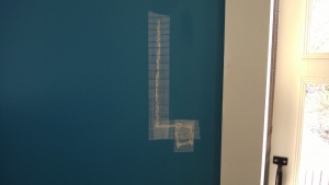 i used drywall tape to cover the hole & slice i cut in the bedroom wall