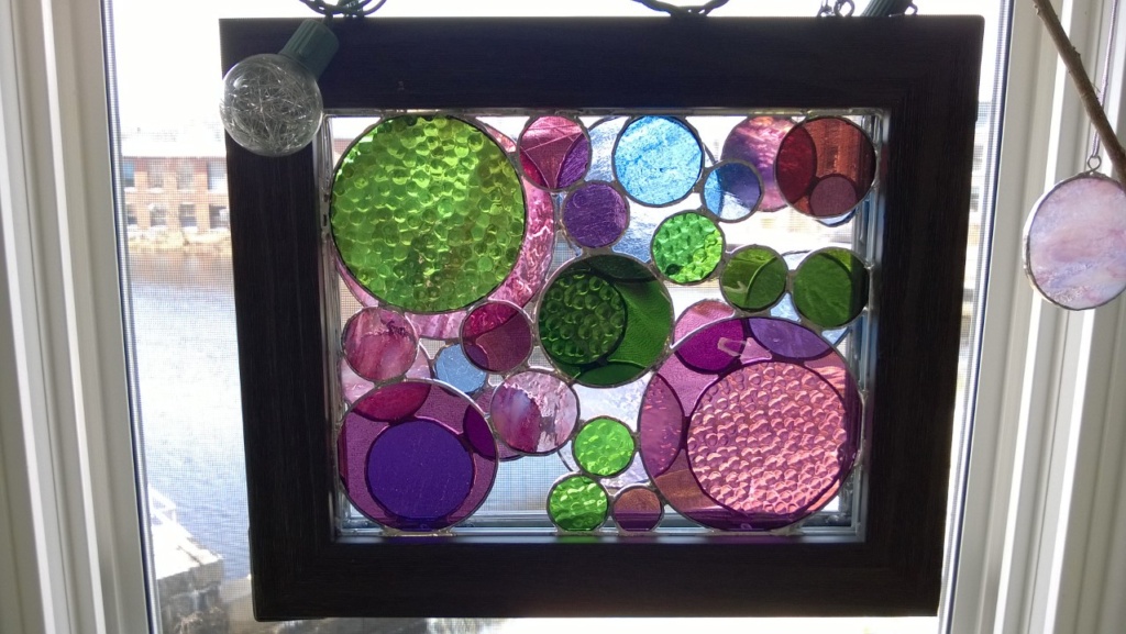 my 3rd stained glass circles project hangs in the bedroom