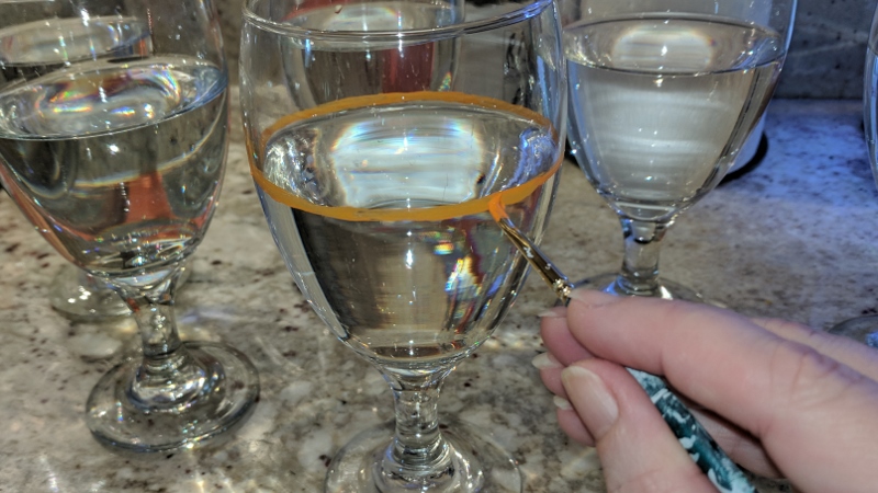 i carefully painted "1 cup" lines around each of our 6 wine glasses