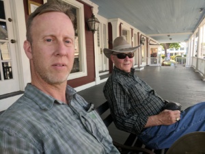 hubby and pop relaxing on a bench in rockport, ma