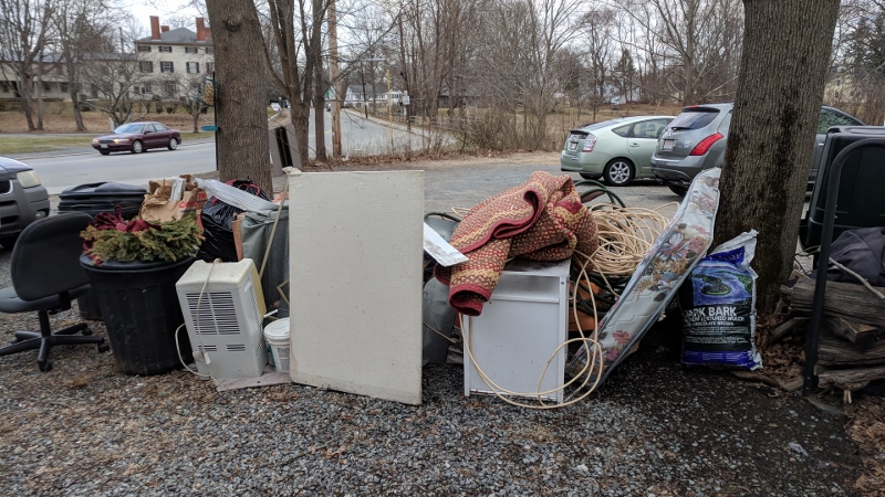 the pile of basement stuff i put in the driveway after the flood