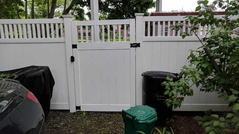 after cleaning, our white yard fence is so shiny and white again!