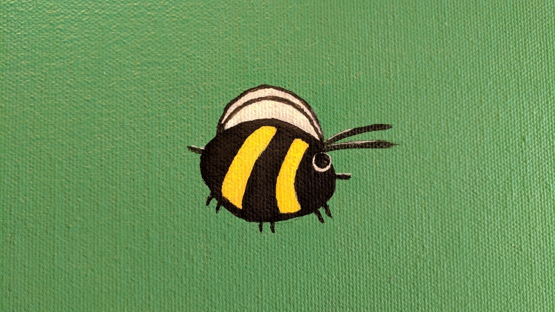 closeup of the bumble bee i painted on the chameleon mural