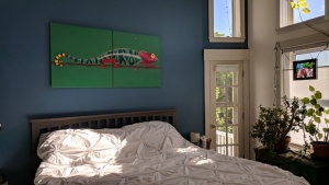 the chameleon mural looks wonderful hung over our bed