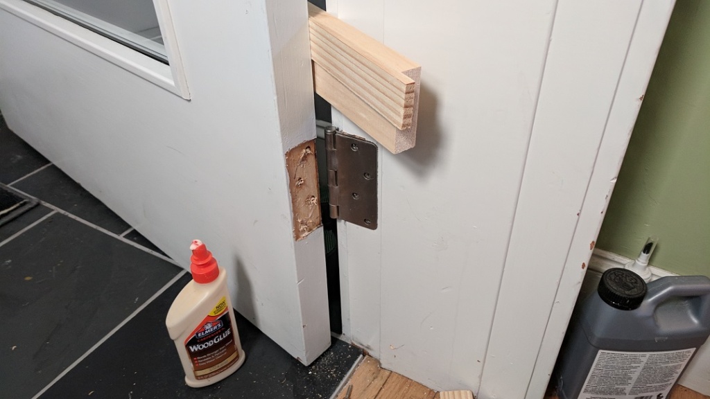 i shimmed the door open to the right width with wood