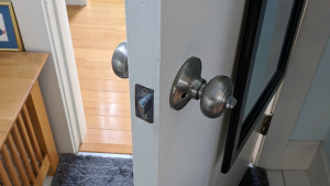 i replaced the brass doorknobs in our house with silver