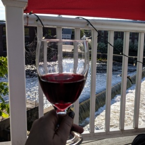 enjoying wine on the deck overlooking the ipswich river
