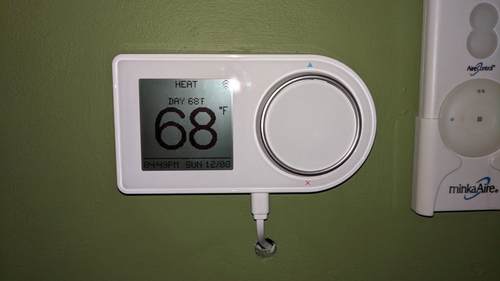 our new living room lux geo smart thermostat with usb cable
