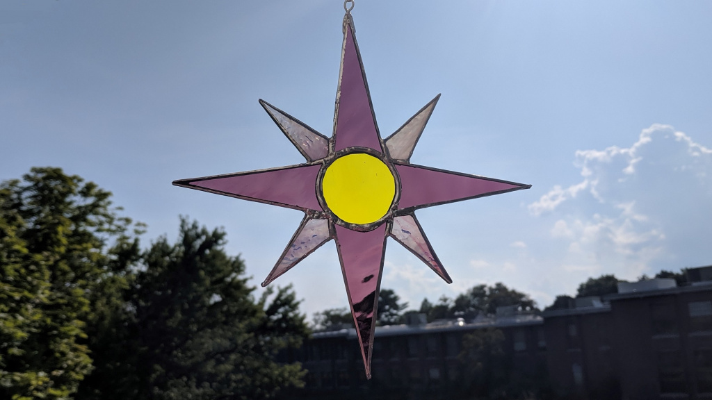 the completed pink and yellow nautical stained glass star
