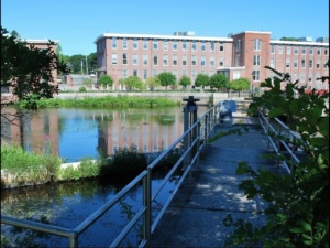the view of ebsco publishing across the ipswich river from the fish ladder walkway