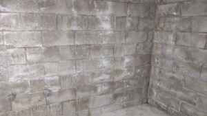 the basement wall before painting on drylok waterproofing sealant