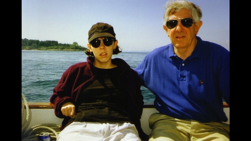 dad and i on dad's catboat in the mid 1990s